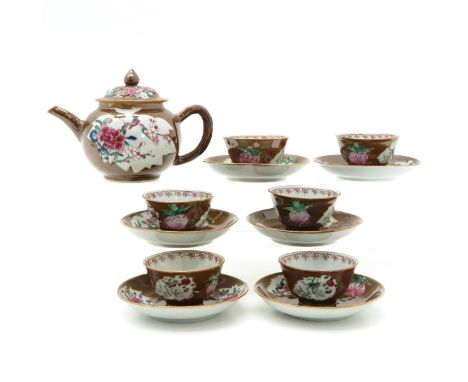 Decorated with florals in Famille Rose enamels, saucers are 12 cm. in diameter, teapot is 12 cm. tall, handle on teapot has b