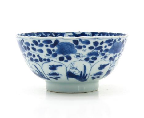 Floral decor with bunnies, marked with double ring and leaf, 14 cm. in diameter. 