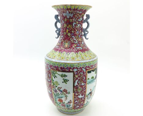 Ruby ground with Famille Rose floral decor, diverse scenes of Chinese figures, animals, and landscape, Qianlong mark, 76 cm. 