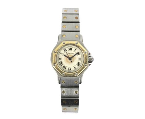 Cartier. Santos Octagon. Reloj de pulsera de dama. Caja y armis en acero con detalles en oro amarillo de 18 k.; esfera con nu