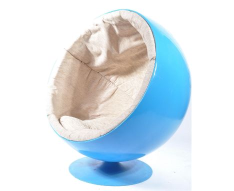 A vintage retro 20th century after Eero Aarnio: A Ball (or Globe) Chair, moulded polyester shell with padded fabric upholster