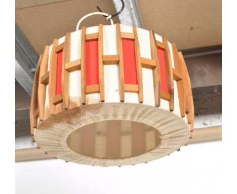 A mid century retro origina lamp shade, circa 1950's hessian and red cylinder design with fittings to interior