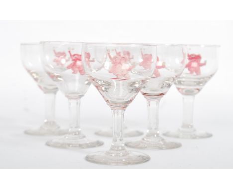 A set of six fantastic vintage 20th century Champagne glasses attributed to The Elephant Club Bristol, each glass with an app
