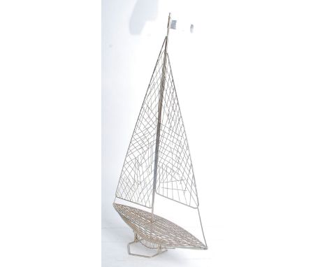 A mid 20th century retro wirework steel sculpture in the form of a yacht. Measures: 71cm high.