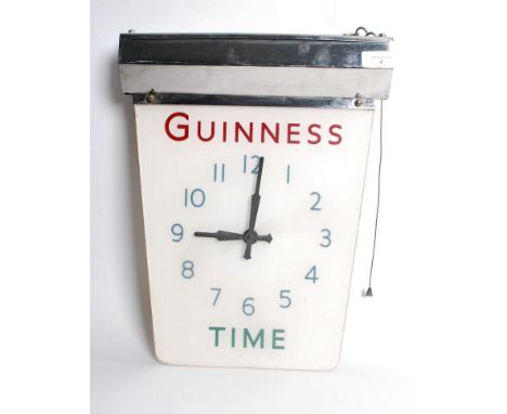 A vintage early 20th century Guinness electric glass and chrome wall / ceilig hanging clock having a chrome light fitting to 