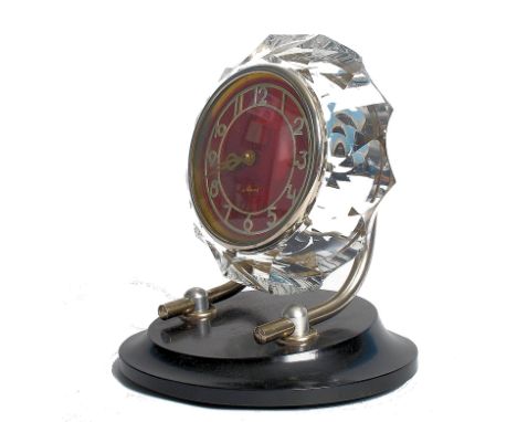 A 20th century Russian 17 jewel movement mantel clock, having faceted circular surround to Arabic numeral dial inscribed Maja