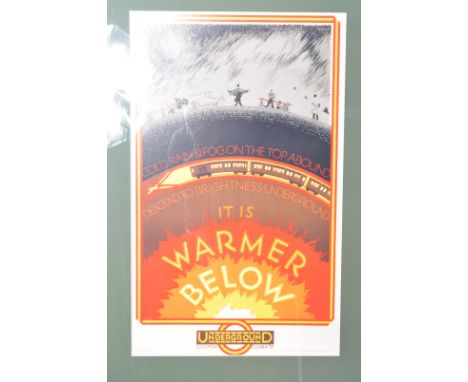 A vintage 20th century reproduction London Underground travel poster It Is Warmer Below depicting a dreary rain soaked scene 