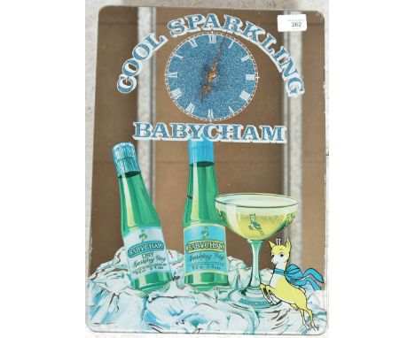 A vintage mid 20th century retro 1960's Babycham advertising point of sale breweriania pub bar display mirror clock of taperi
