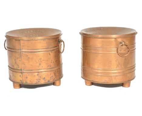 A pair of early 20th century vintage copper ' Cigarette Ends ' bins. Each of cylindrical form with inverted top having centra