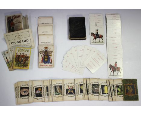 Four packs of playing cards, comprising 'On Guard A New Military Card Game' by Jaques &amp; Son, 49 cards, boxed with instruc