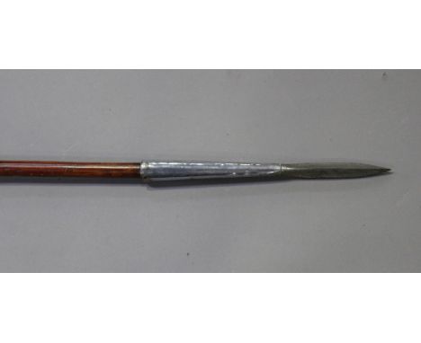 A mid to late 20th century lance with chrome finished triangular spear tip and turned chromed butt, socketed onto a bamboo sh
