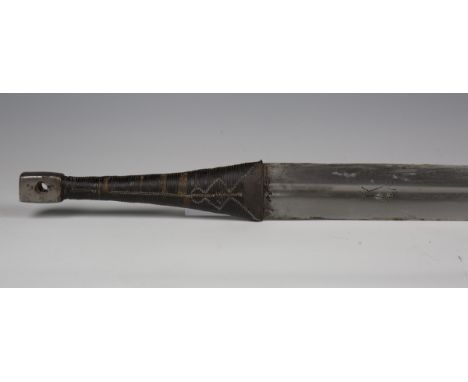 A late 19th century Omani katara with double-edged single-fullered blade, blade length 86cm, with etched animal mark, possibl