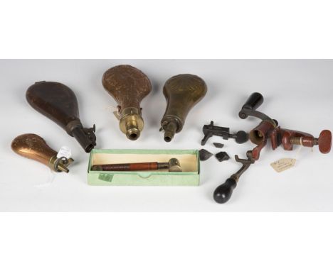 A late 19th century G. &amp; J.W. Hawksley cartridge loading tool, together with a pair of boxed powder measures and four sho