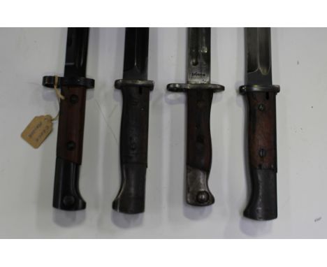 A group of four K98 Mauser bayonets, including a Siamese issue, blade length 25cm, a Czechoslovakian issue, blade length 30cm