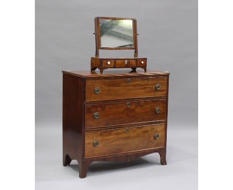 A Victorian mahogany chest of three long drawers, height 86cm, width 87cm, depth 41cm, together with a swing frame mirror, th