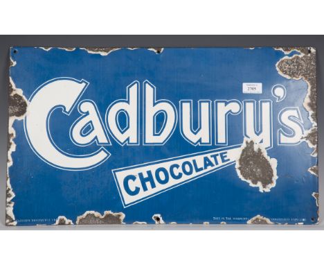 A Cadbury's Chocolate enamel advertising sign, 61cm x 35cm.Buyer’s Premium 29.4% (including VAT @ 20%) of the hammer price. L