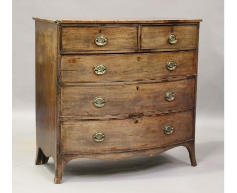 A George III mahogany bowfront chest, fitted with two short and three long drawers, on outswept bracket feet, height 106cm, w