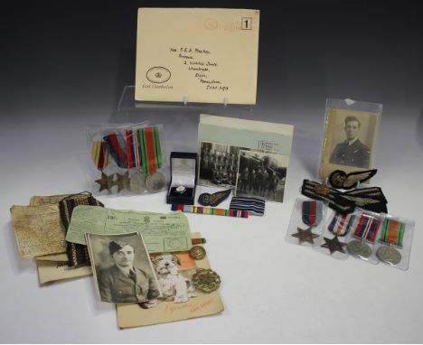 Four Second World War period medals, comprising 1939-45 Star, Africa Star, Defence Medal and War Medal, a ribbon bar, a Veter