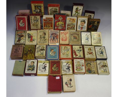 A good collection of approximately thirty-six boxed packs of playing card games, including 'Weights &amp; Measures' and 'Ujij
