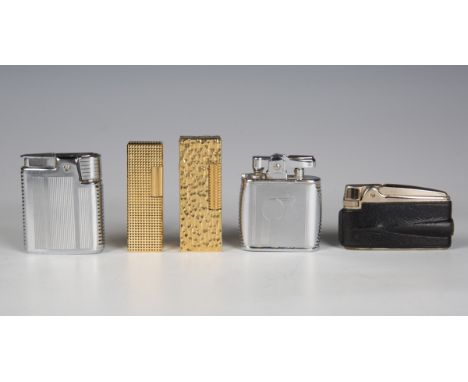 A gold plated Dunhill pocket gas lighter, length 6.4cm, cased, a similar Colibri lighter, three other lighters and five pipes