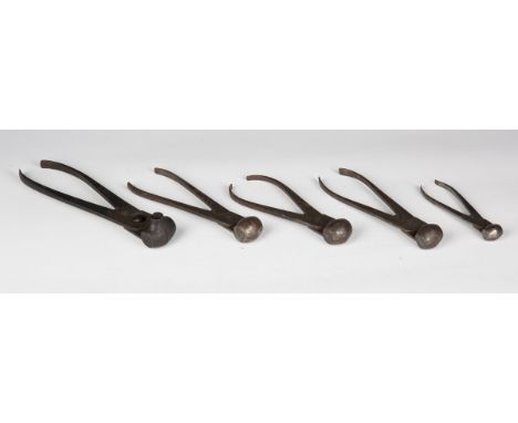 A group of five 19th century steel scissor-action bullet moulds.Buyer’s Premium 29.4% (including VAT @ 20%) of the hammer pri