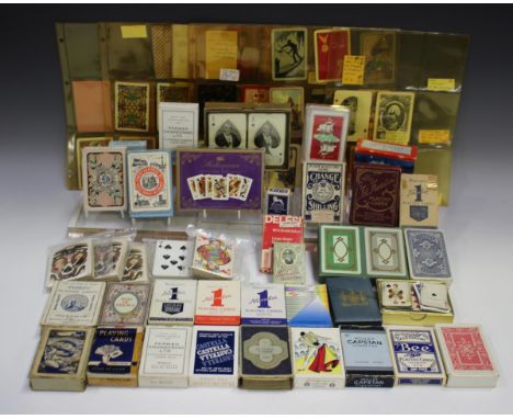 A large collection of mainly 20th century playing card packs, including some advertising packs 'Capstan Cigarettes', 'Perman 