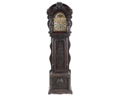 A carved oak longcase clock,18th century and later, the broken arch moon phase dial inscribed 'James Kirkham Holywell', with 