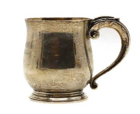 A silver mug, by Asprey, retailed by Liberty, Birmingham 1937,11cm high 14oztCondition ReportGood guage.Light tarnishing and 