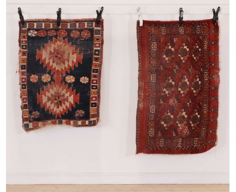 A Turkoman small rug or tent panel,19th century, Turkestan, with repeating guls to a brick red ground,83.5 x 131cmtogether wi