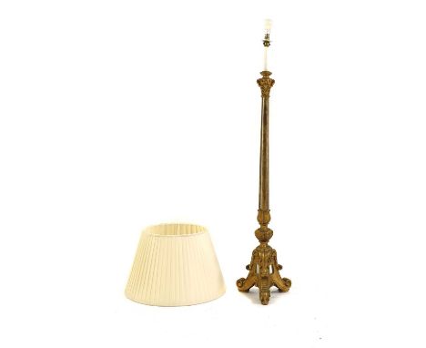 A giltwood and mirrored glass standard lamp,20th century, Continental, in the Louis XVI-taste, on a scrolling tripod base, 30