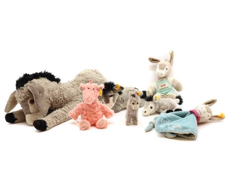 A collection of modern Steiff donkeys,with yellow labels to ears,60cm wide the largest (7)Condition ReportSmaller grey exampl