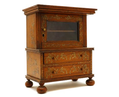 A miniature Anglo-Indian hardwood cabinet,with ivory inlay, the glazed door over two long drawers, on ball feet,29cm wide17cm