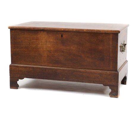 A mahogany coffer,with a single moulded frieze drawer, raised on bracket feet, with brass handles,94cm wide49cm deep55cm high