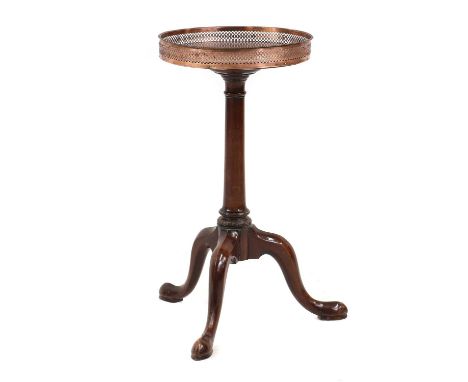 A George III style mahogany wine table,19th century and later, with a silver-plated pierced gallery, raised on a gun barrel c