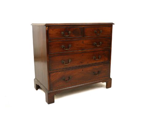 A George III mahogany chest of drawers,with two short and three long drawers, brass handles on bracket feet94cm wide61cm deep