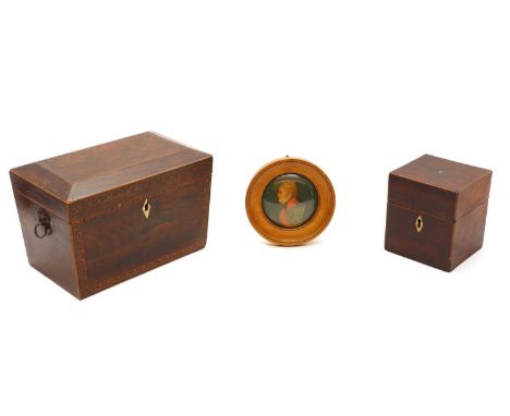 A Regency rosewood, boxwood and ebony tea caddy, sarcophagus form, with bone escutcheon and brass lion mask handles, the inte