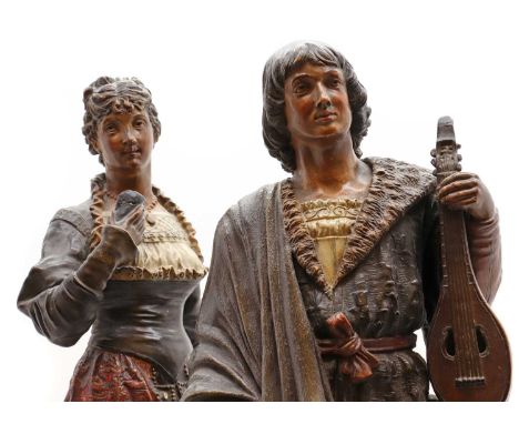 A pair of pottery figures,20th century, modelled as a maiden holding a mask, and a gentleman with a lute, impressed marks 'Sc