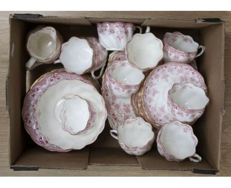 A pink ground decorated Edwardian tea and sandwich set, bone china, pink and white sandwich / biscuit plates, small side plat