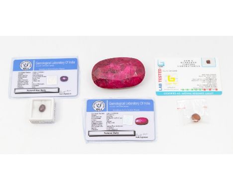 An oval cut natural Ruby, 672.3ct, 68.98 x 41.40 x 22.63mm, colour enhanced, opaque, as per Gemological Laboratory of India C