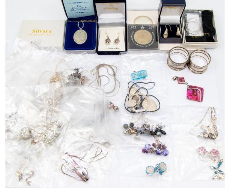 A large&nbsp;&nbsp;collection of silver and white metal jewellery to include a cubic zirconia set necklace with gold plated d
