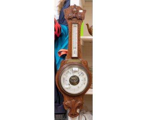 A George V oak framed aneroid barometer