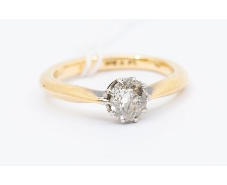 A diamond and 18ct gold solitaire ring, comprising an old mine cut diamond weighing approx 0.50ct, assessed clarity I2, asses