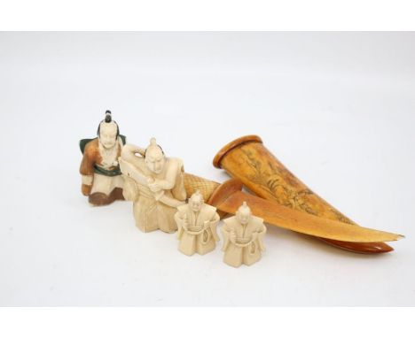 A group of four early 20th Century Japanese ivory netsuke carved as warriors, one painted with signature to base together wit