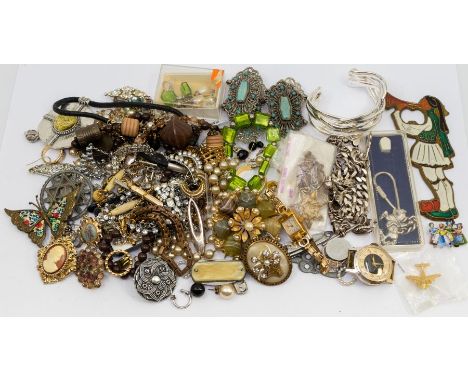 A collection of costume jewellery&nbsp;to include a&nbsp;silver charm bracelets, along with silver watch chain and a silver b