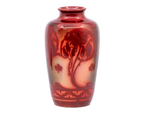 A Bernard Moore shouldered form vase, by John Adams, painted with Art Nouveau flower stems in shades of ruby flambe between b