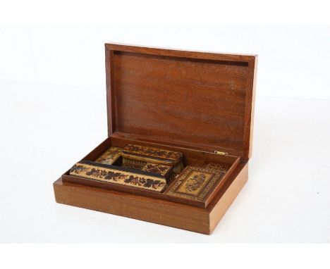 A Tunbridge ware dressing table box with accessories, including two brushes, a small box, a trinket box, a letter opener, car