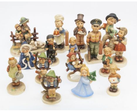 A collection of Goebel figures of children to include: pair of taperstick holders pattern 117; Shepherd with sheep 99; Apple 