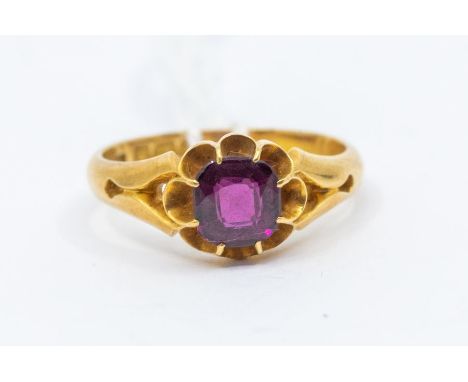 A early 20th century amethyst and 18ct gold ring, comprising a cushion shaped claw set amethyst, size P1/2, total gross weigh