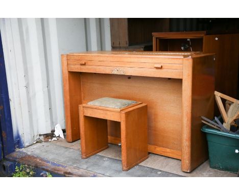 A 1950's light oak wall piano with accompanying stool, also with pine children's high chair