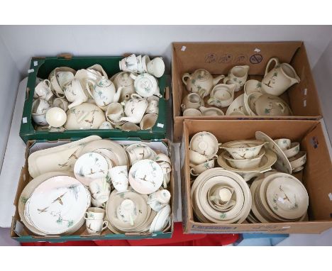 An extensive collection of Royal Doulton "The Coppice" tableware to include: dinner plates, plates, bowls, tureens and covers